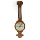 Walnut Mercurial wheel barometer with silvered dial and thermometer gauge 93cm high
