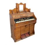 Victorian walnut cased organ by Beringer & Strohmenger with stops and pedals, h136 x w100 x d41cm,