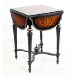 Late19th/early 20th century ebonised and marquetry inlaid table with four drop flaps decorated with