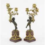 Pair of late 19th/early 20th century red marble, bronze and gilt metal three light candelabra in