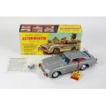 James Bond 007 - Gilbert (Japan) tinplate battery operated James Bond's Aston Martin DB5 as seen in