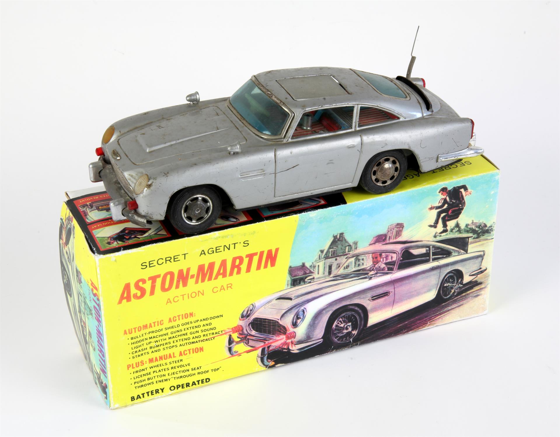 James Bond battery-operated Secret Agent's Aston-Martin Action Car in original box, Made in Japan.