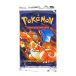 Pokemon TCG sealed Base Set Booster pack, Charizard artwork. The vendor formerly owned a gift shop
