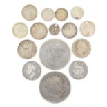 Selection of British silver coins to include: Two crowns 1819 and 1820, three shillings 1824,