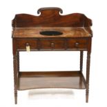19th century mahogany wash stand with three dummy drawers to frieze on fluted legs with foliate