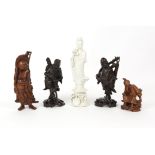 Pair of Chinese root carvings with wire inlay two other root carvings and blanc de chine figure of