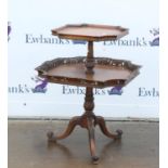 Weiman mahogany and burr walnut two tier table, the burr walnut tops on acanthus carved support and