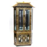 Chinese black lacquered display cabinet with pagoda top and bevelled glass doors,