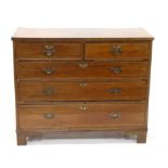 Mahogany chest of two short over three long graduating drawers, on bracket feet, h90cm w109.