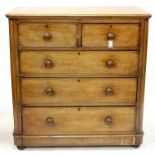 Victorian mahogany chest of two short over three long drawers, on bun feet