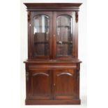 Victorian mahogany bookcase cabinet, the glazed top section with two doors over frieze drawer and