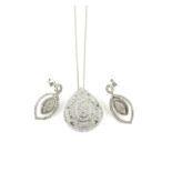 Contemporary diamond set tear drop pendant, set baguette cut and round brilliant cut diamonds,