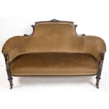 Victorian rosewood framed sofa with carved back and arms on turned support and casters - 101 cm