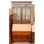Early 20th century mahogany bureau bookcase, with glazed doors above bureau with fitted interior