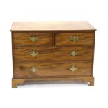 Early 20th century mahogany chest of two short over two long drawers, on bracket feet