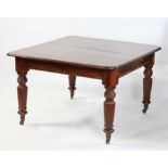 Victorian mahogany extending dining table with two extra leaves on turned and fluted legs to