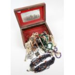 Wooden jewellery box containing, a multi gem set necklace, set with pink topaz, oval cabochon cut