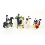 Collection of Staffordshire and Fairings style figures, to include Wellington, Garibaldi, Moody,