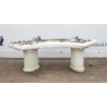 Reconstituted stone garden bench, on two column supports, h37cm w123cm d48cm