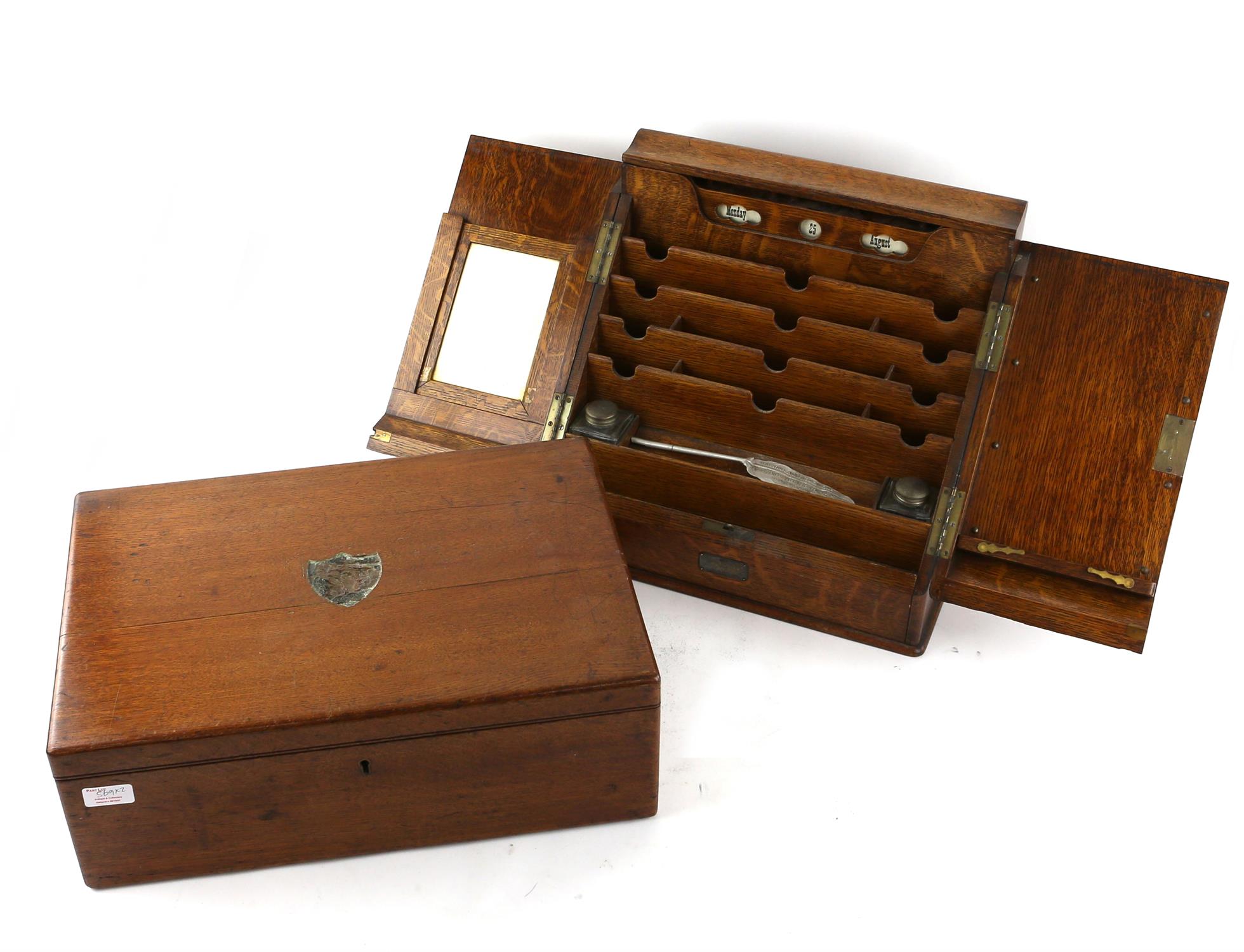 Victorian oak stationery cabinet the sloping doors opening to reveal perpetual calendar letter