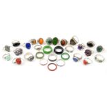 Thirty rings paste and gemstone set rings, including a silver set cabochon cut lapis lazuli ring,