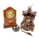 Early 20th century mahogany and marquetry inlaid twin train mantel clock on squashed brass bun feet,