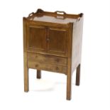 19th century mahogany commode, with gallery top over two cupboard doors and drawer on square legs,