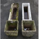 Two reconstituted stone planters of square tapering form, h36cm w29cm d30cm, together with two