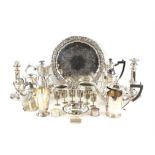 AMENDED DESCRIPTION Silver plated items to include salver with foliate scroll border,