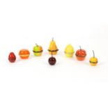 Eight Halcyon Days enamelled novelty boxes in the form of fruit, to include lemon, orange,