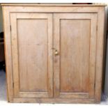 Pine cupboard with two doors containing two shelves, h129.5cm w129cm d42cm