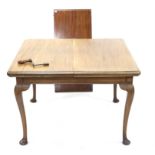 20th century mahogany extending dining table with one extra leaf, with winder, h72cm w151cm d100cm,