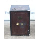 J Cartwright & Son West Bromwich cast iron safe, with two keys, h61cm w43cm d43cm