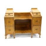 Art Deco walnut dressing table, with two small drawers to top section above four drawers and