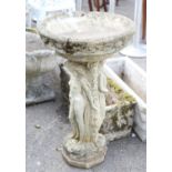 Reconstituted stone bird bath, with caryatid support on an octagonal base, h80cm diameter 50cm