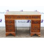 20th century yew wood pedestal desk with nine drawers on bracket feet