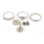 Collection of silver diamond set jewellery including, three rings, two in the style of half