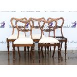Five 19th century rosewood balloon back dining chairs, with drop-in seats (1 seat missing),