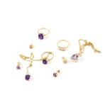 A group of gold jewellery, including, two amethyst pendants and chains, two amethyst rings,