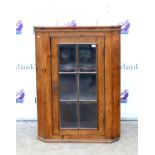 19th century oak corner cabinet, with astragal glazed door revealing two shelves, h115.