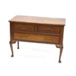 20th century mahogany dressing chest, with two short over one long drawer, on cabriole legs and pad
