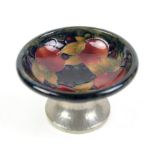 William Moorcroft for Liberty & Co, small pedestal dish, the shallow bowl decorated in the