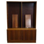 Mid century hardwood bookcase, with eight adjustable shelves about two cupboard doors with three