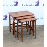 Mid century teak nest of three tables on tapering legs joined by stretchers, largest h53cm w53cm