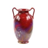 Royal Doulton Sung vase the ovoid body with twin handles, high fired glaze, red with swirls of