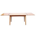 Danish teak draw leaf dining table, on tapering supports, h74.5cm w129cm d84.5cm