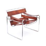 Wassily chair by Marcel Breuer, with brown leather upholstery on a tubular chrome frame,