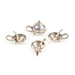 Georg Jensen, three silver salt cellars and spoons, design no. 110, with scroll handles,