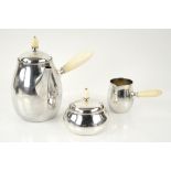 Georg Jensen silver three piece coffee service, of rounded form with beaded decoration,