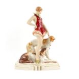 Royal Dux Art Deco figure of a girl with two borzoi, applied pink triangle, impressed and printed